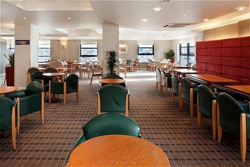 Dining area at the Luton Airport Express by Holiday Inn