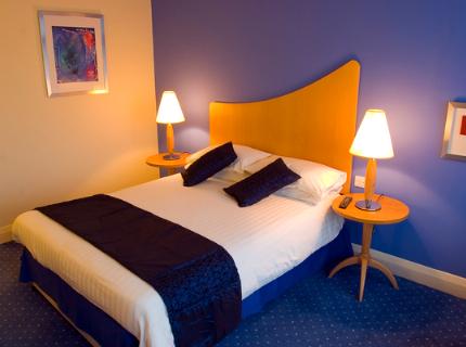 Guest bedroom at the Chiltern Hotel Luton Airport