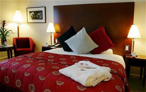 Bedroom at the Crowne Plaza NEC Hotel Birmingham Airport