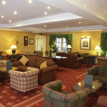 Hotel lounge at the Best Western Premier Yew Lodge East Midlands Airport
